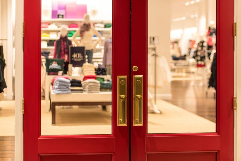 Big red doors looking into a retail store