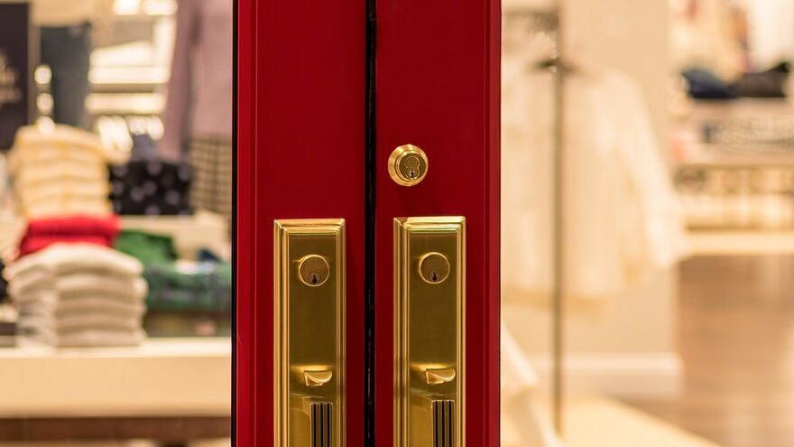 Big red doors looking into a retail store